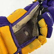 Used Yellow and Purple CCM 4 Roll Pro Gloves | 14" | E451