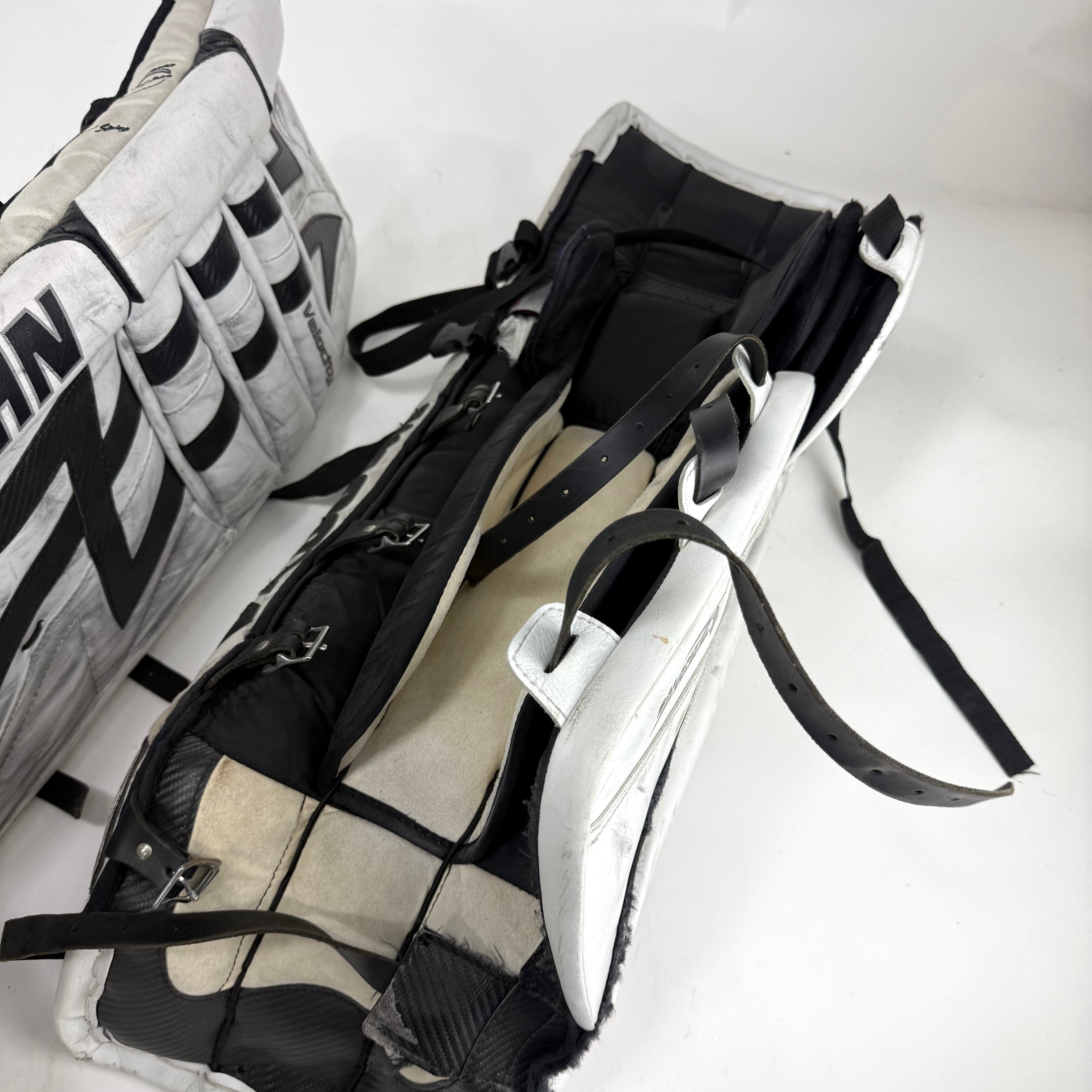 Used White and Black Vaughn Velocity 7400 Goalie Pads | 34 +1" - Top Flight Hockey
