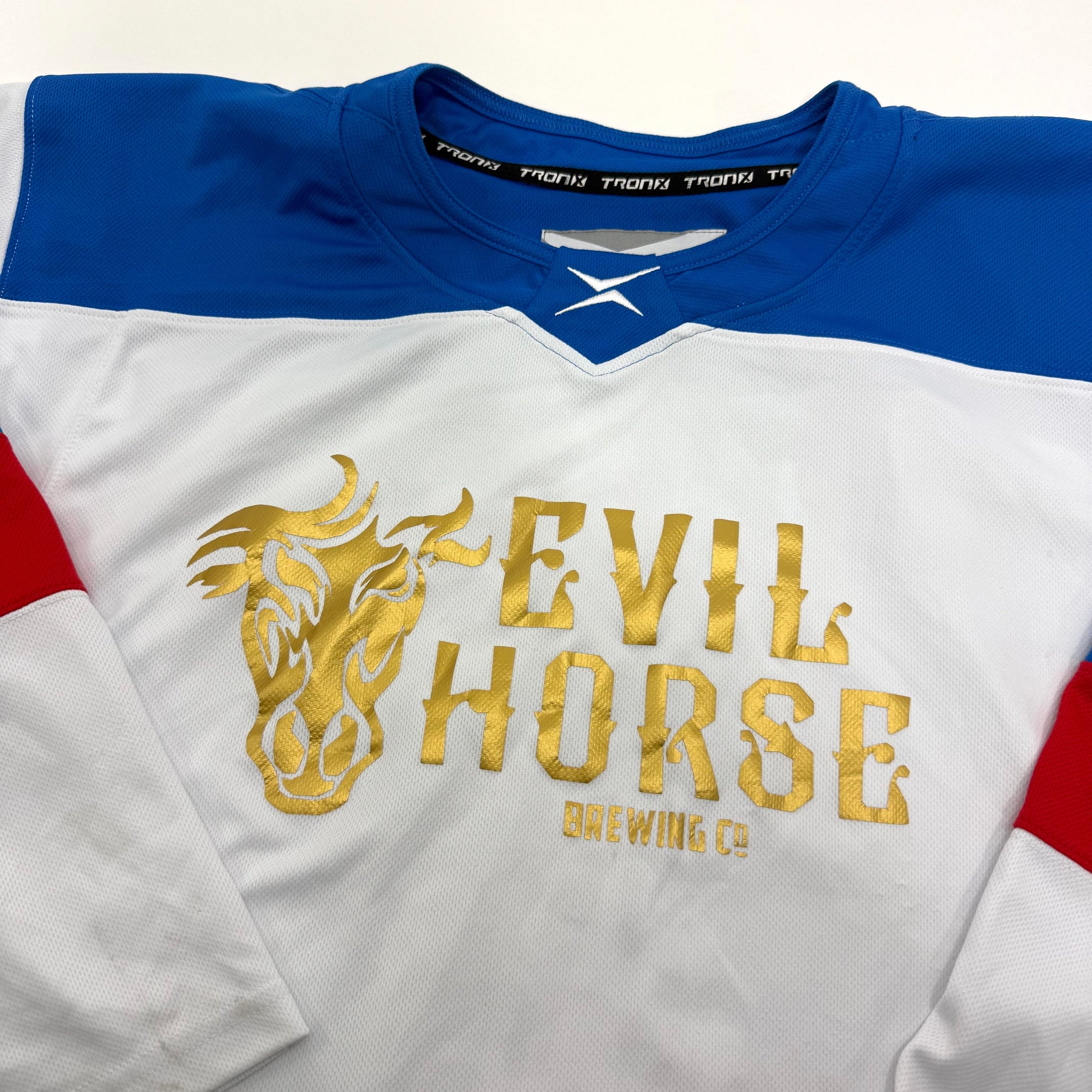 Used White/Blue/Red Tron Evil Horse Brewing Jersey | Large | A104 - Top Flight Hockey