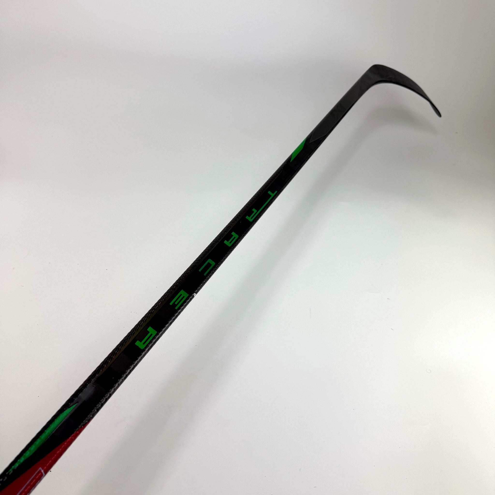 Used Left Red/Green Bauer Nexus Tracer | 82 Flex P28 Curve Grip | F339