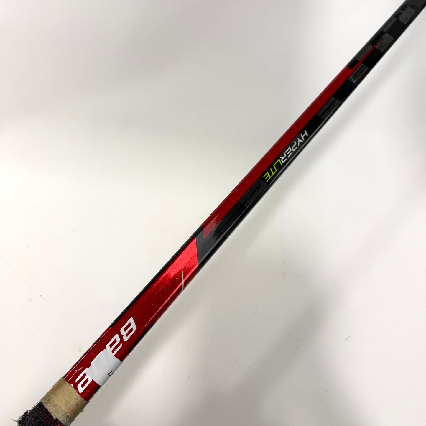 Used Left Red Bauer Vapor Hyperlite | 77 Flex P92 Curve Grip | AB937
