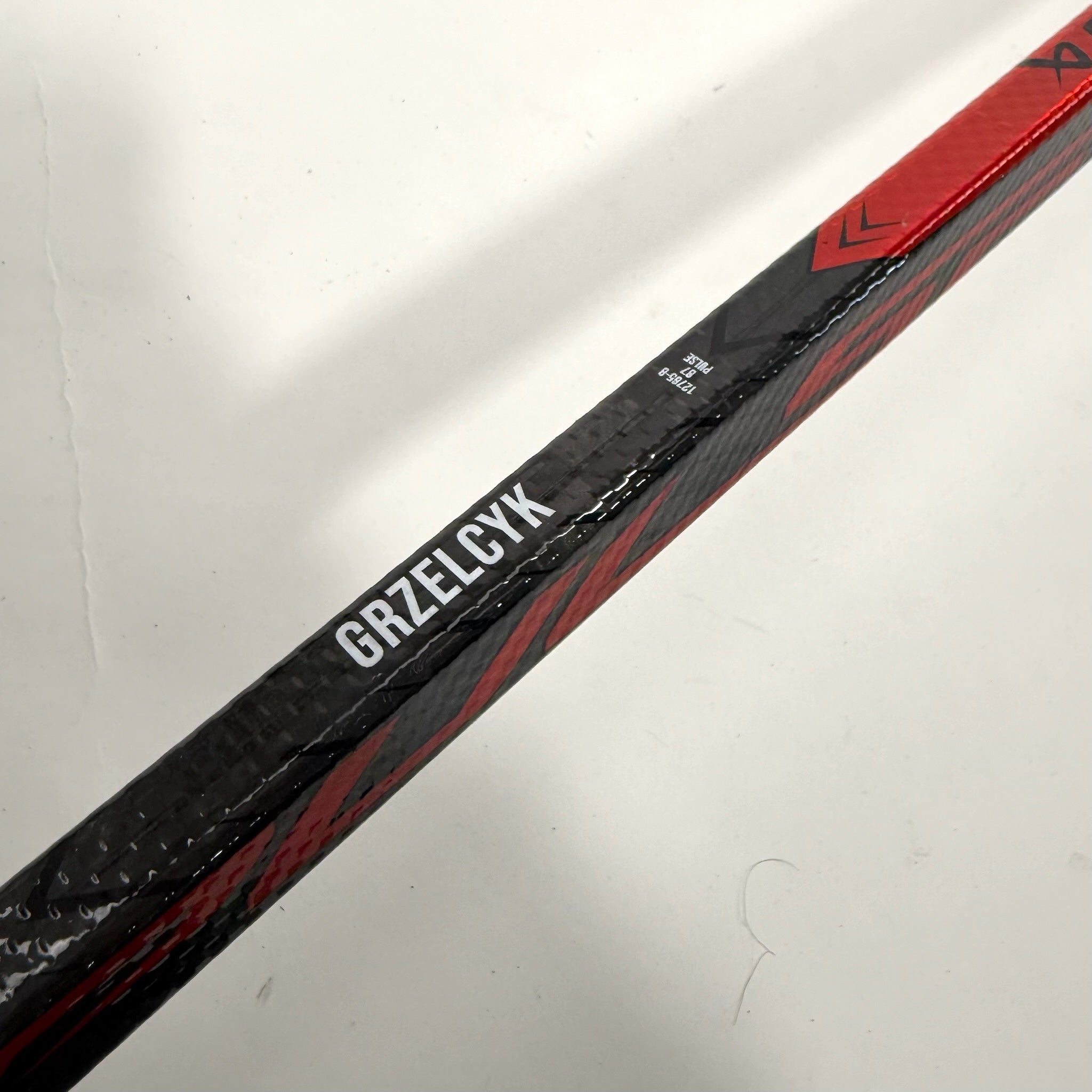 Used Left Red Bauer Pulse | 87 Flex P28 Curve Grip | Matt Gryzelcyk | BH140 - Top Flight Hockey