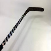 Used Right Blue and Gold Warrior Novium Pro | 85 Flex P92M Curve Grip | E730 - Top Flight Hockey