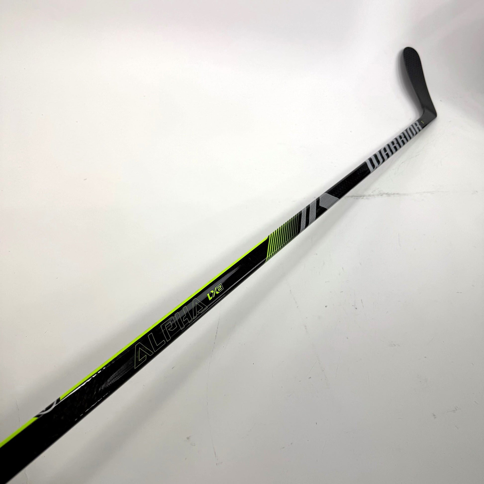 New Left Warrior Alpha LX2 | 75 Flex W90 Curve Grip | BH248 - Top Flight Hockey
