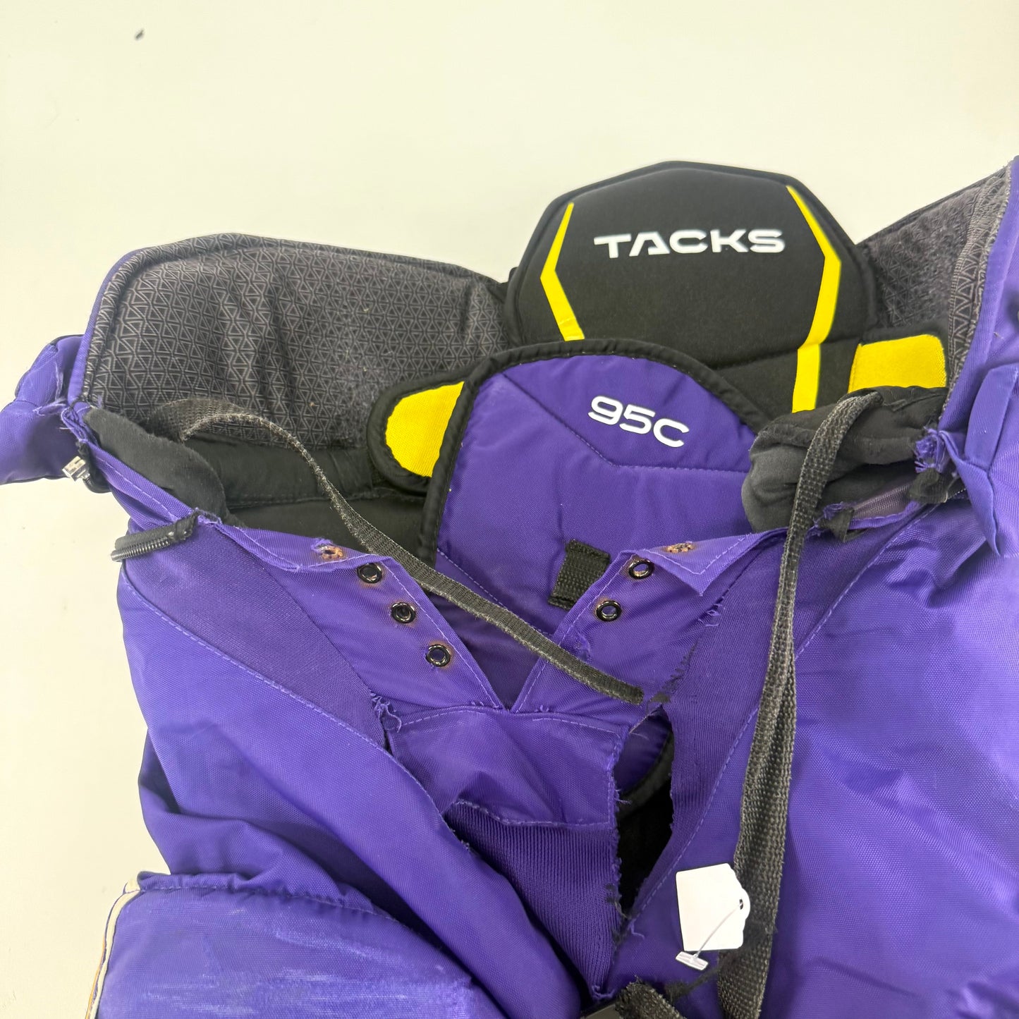 Used Purple/Yellow CCM Tacks 95C Pants | Small | E540