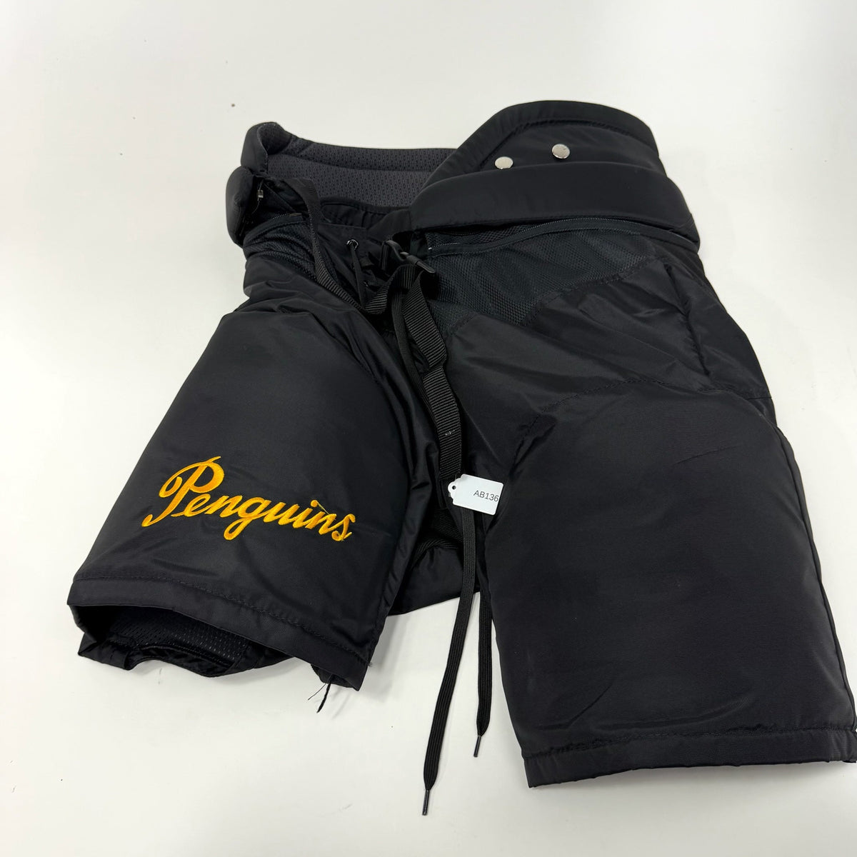 Used Black Penguins CCM HPTK Pants | Large | AB136 - Top Flight Hockey