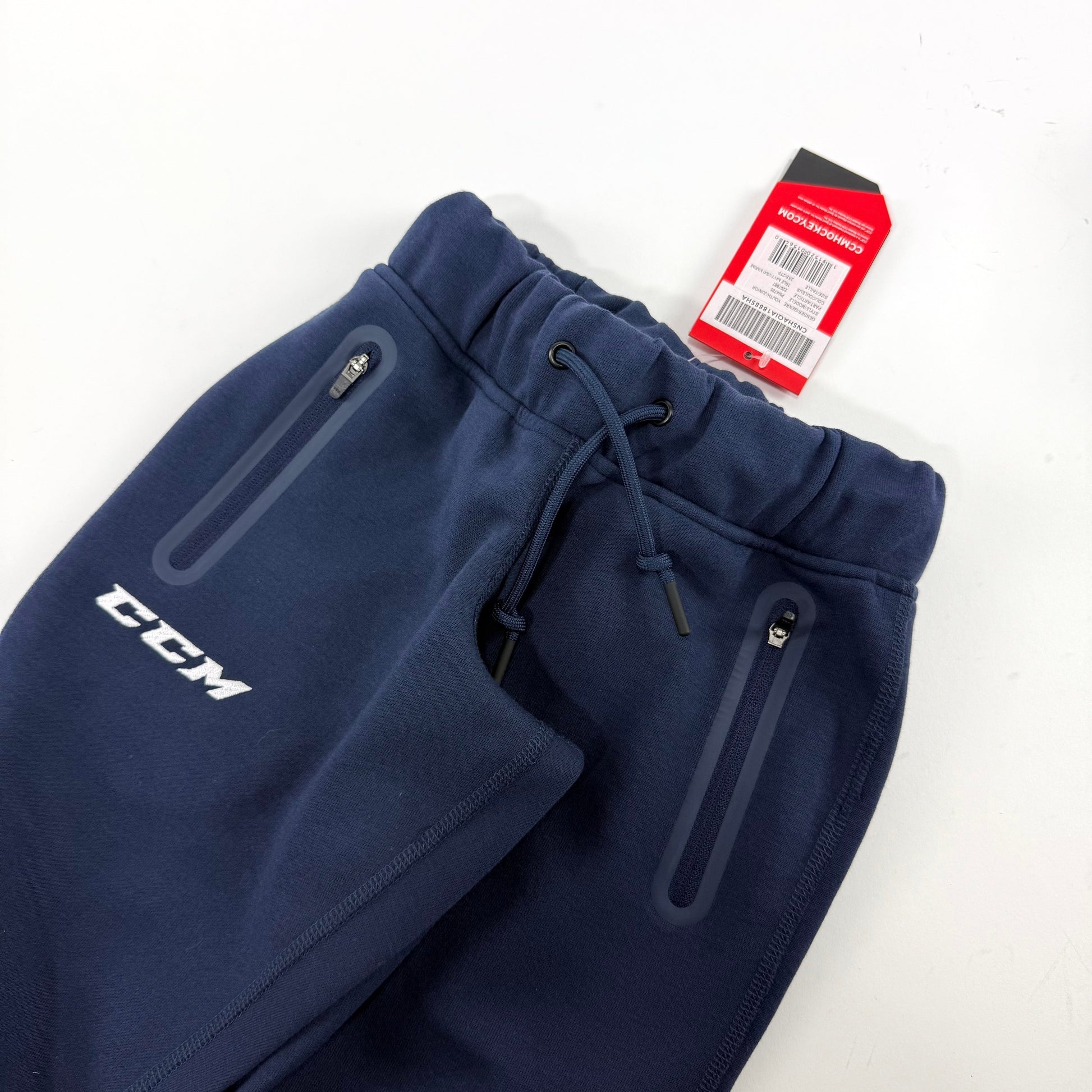 New Navy CCM Youth Premium Tapered Fleece Pant | Youth XXS | #191520015640 - Top Flight Hockey