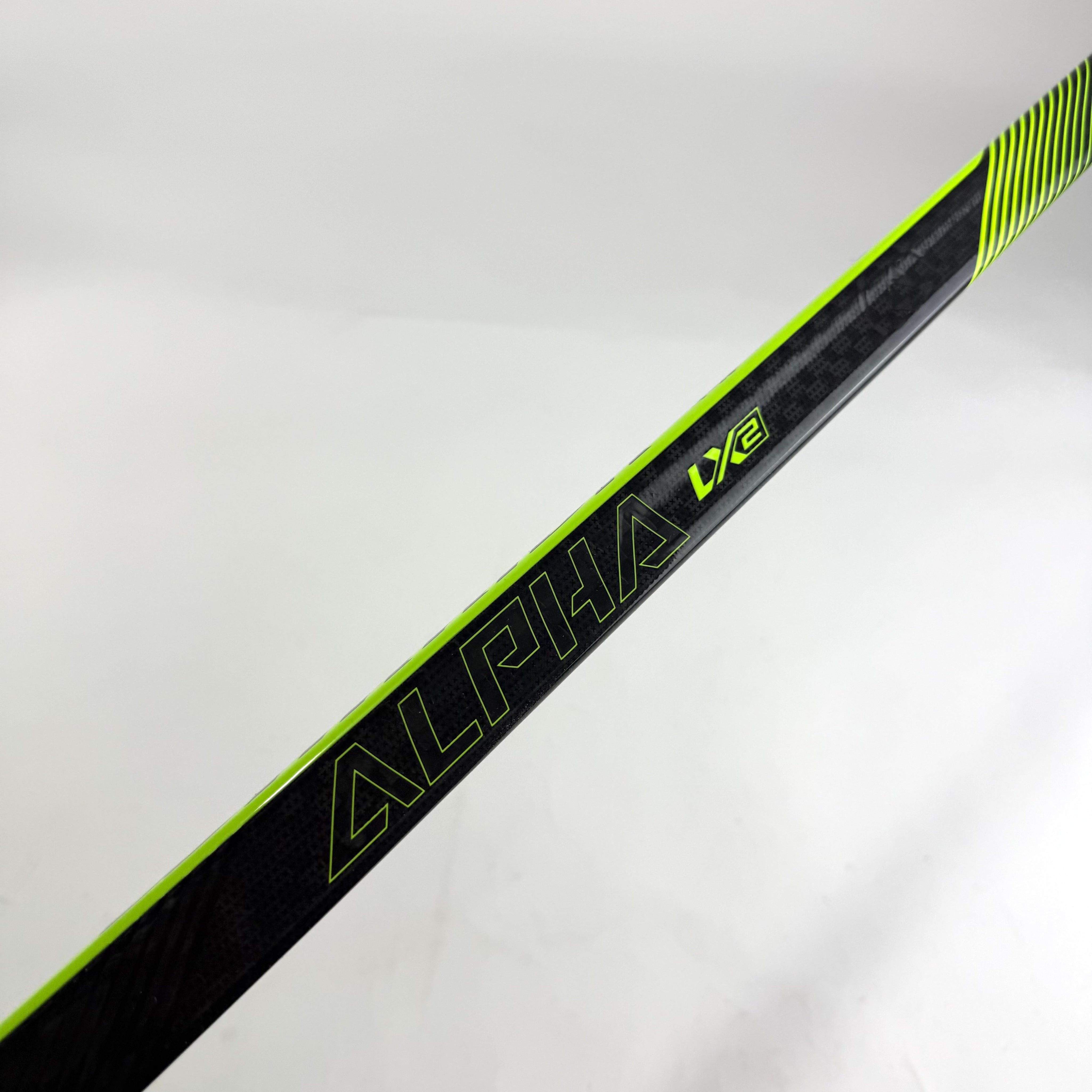 New Left Warrior Alpha LX2 | 75 Flex W88 Curve Grip | E641 - Top Flight Hockey