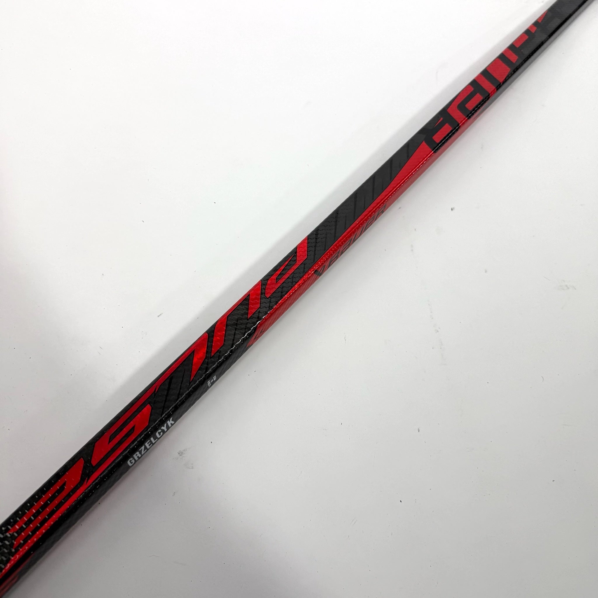 Used Left Red Bauer Pulse | 87 Flex P28 Curve Grip | Matt Gryzelcyk | BH133 - Top Flight Hockey
