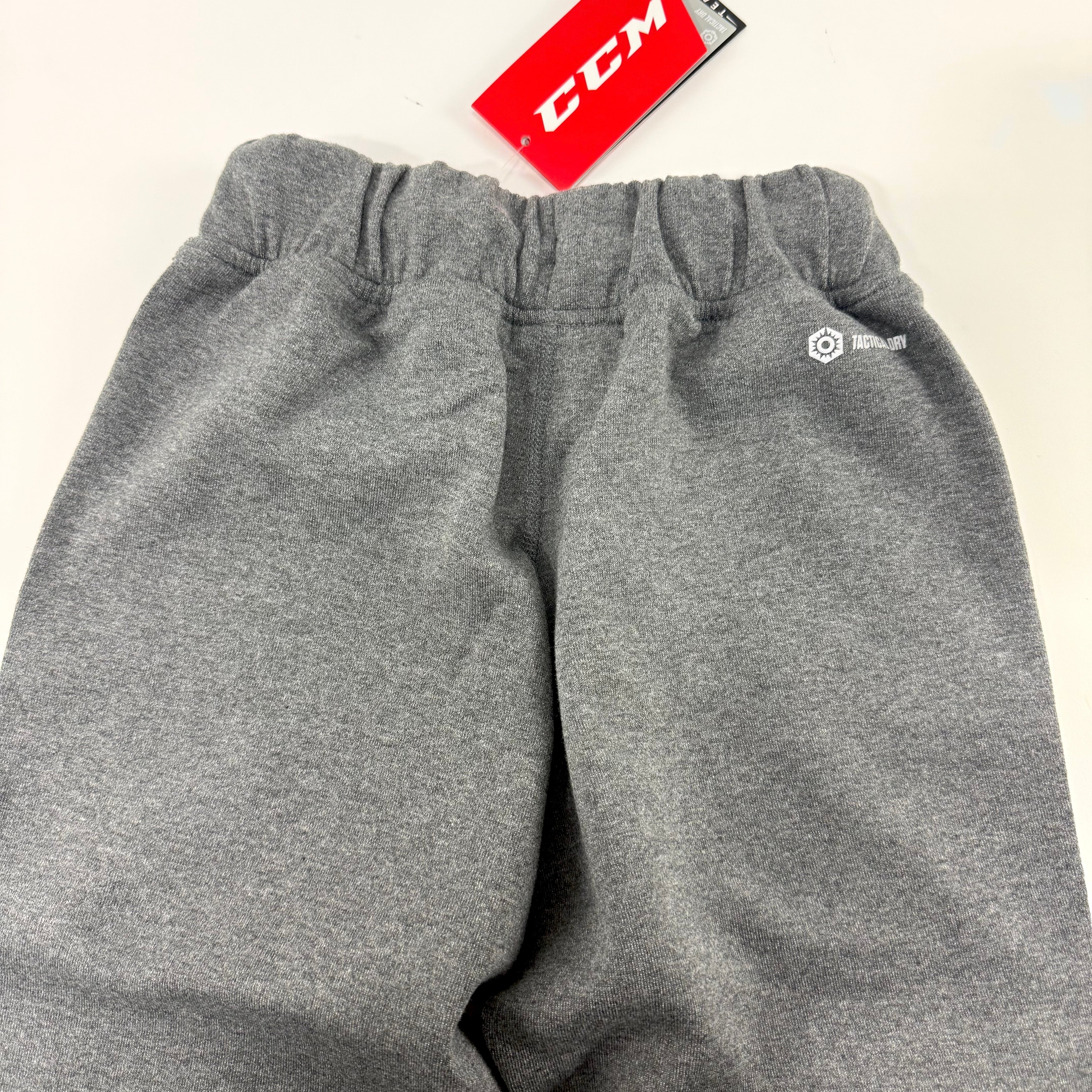 New Dark Grey CCM Youth Premium Tapered Fleece Pant | Youth XS | #191520015602 - Top Flight Hockey