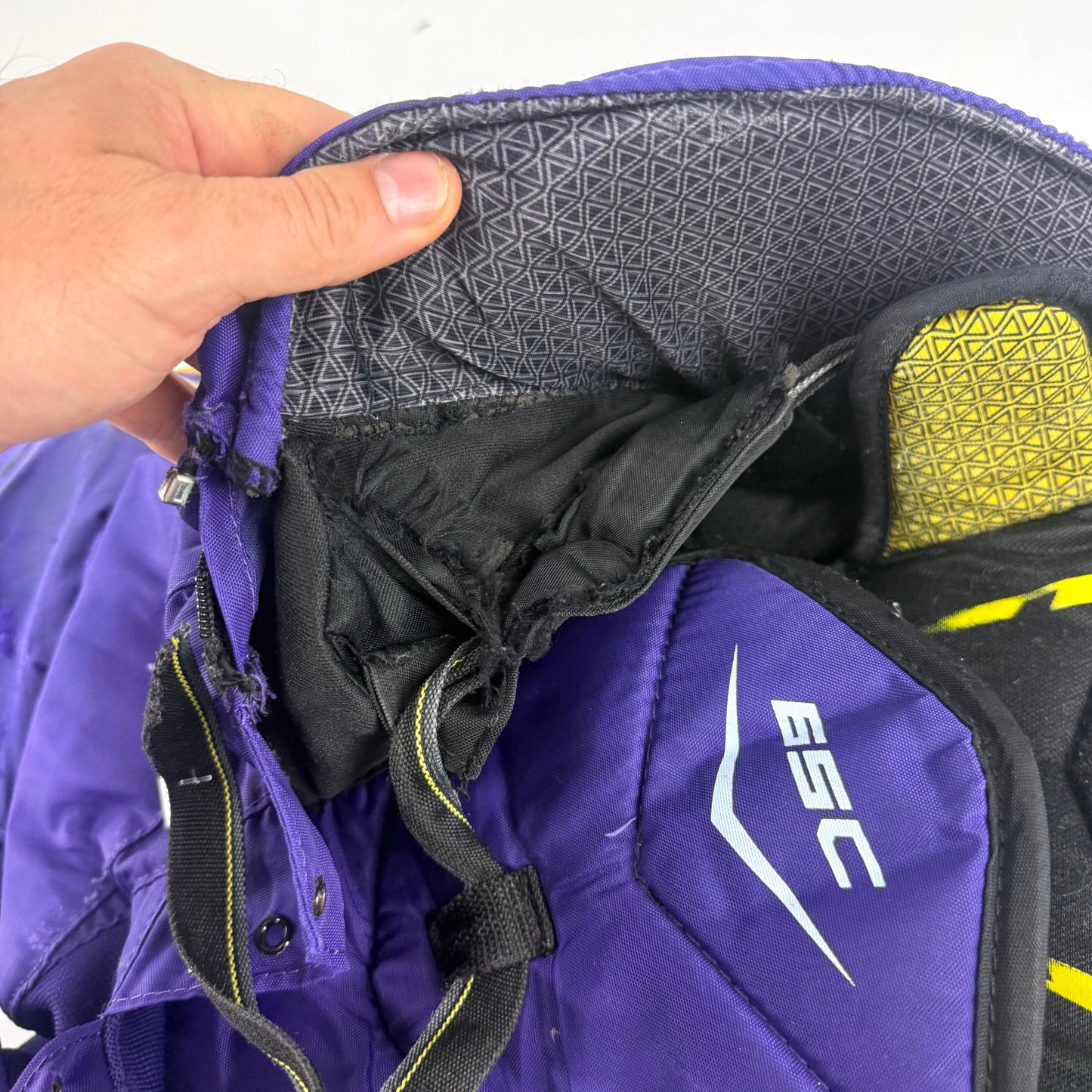 Used Purple/Yellow CCM Tacks 65C Pants | Small | E549