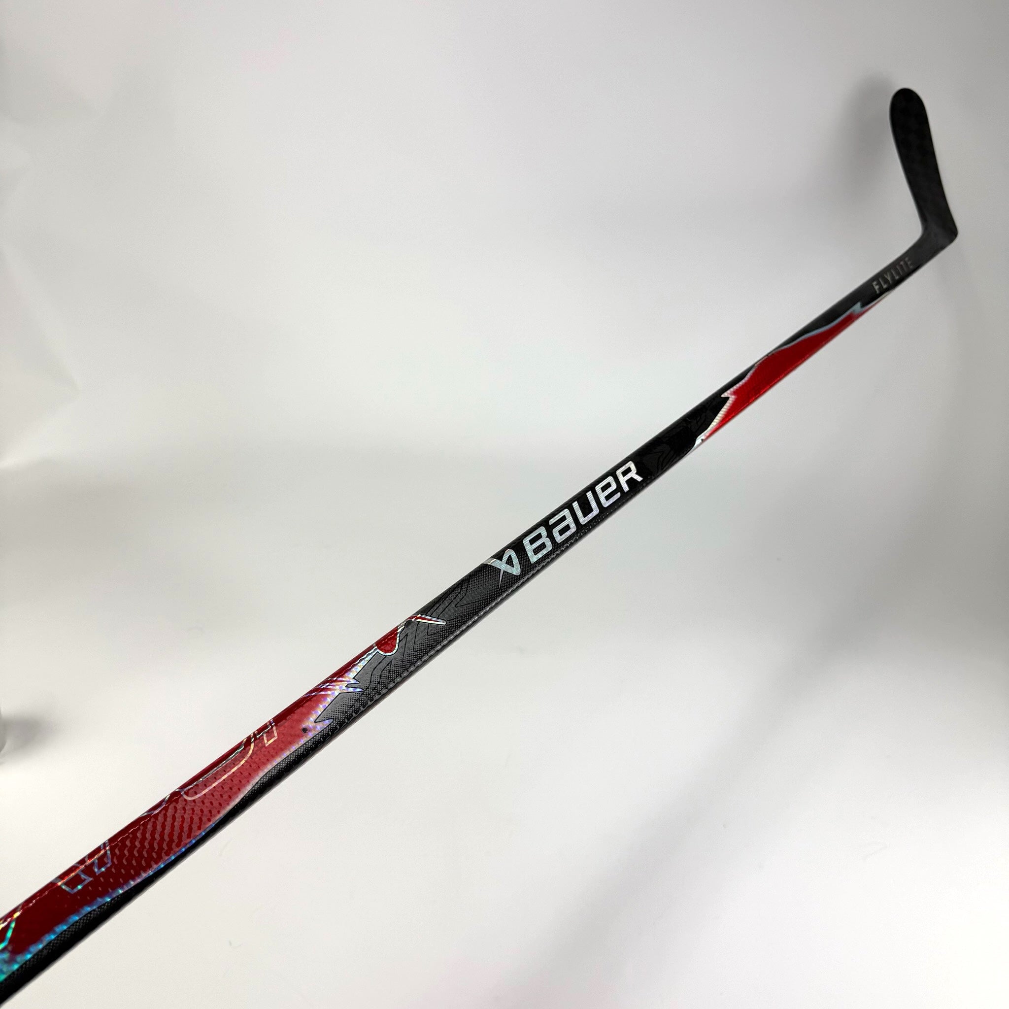 Used Left Red Bauer Flylite | 87 Flex P28M Curve Grip | J566 - Top Flight Hockey