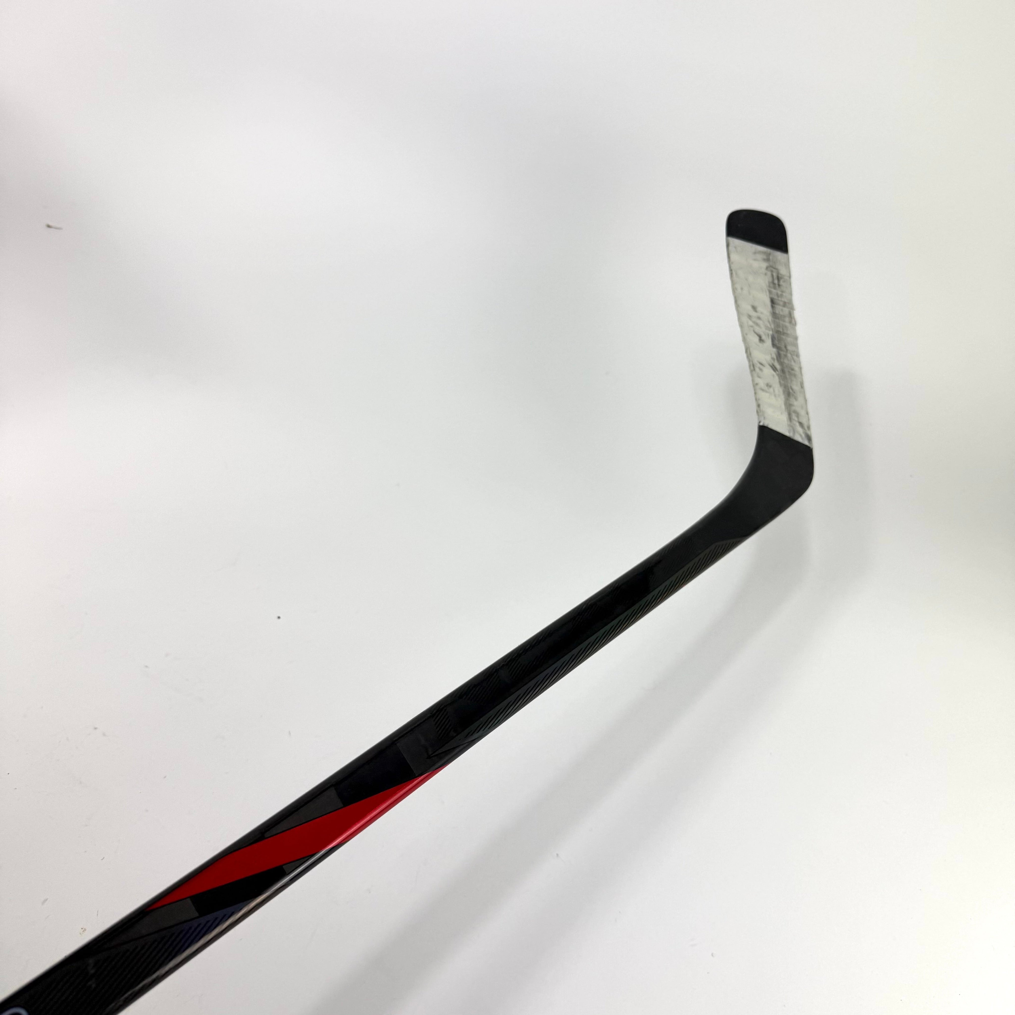 Used Left Red Bauer Nexus Tracer | 65 Flex Kane Pro Curve Grip | R424 - Top Flight Hockey