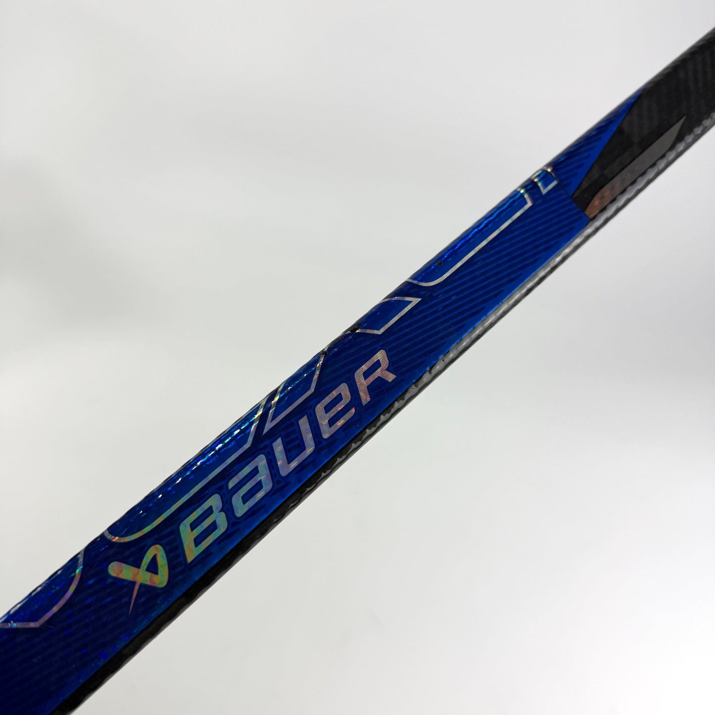 Repaired Right Blue Bauer Nexus Tracer | 95 Flex P28M Curve Grip | R25