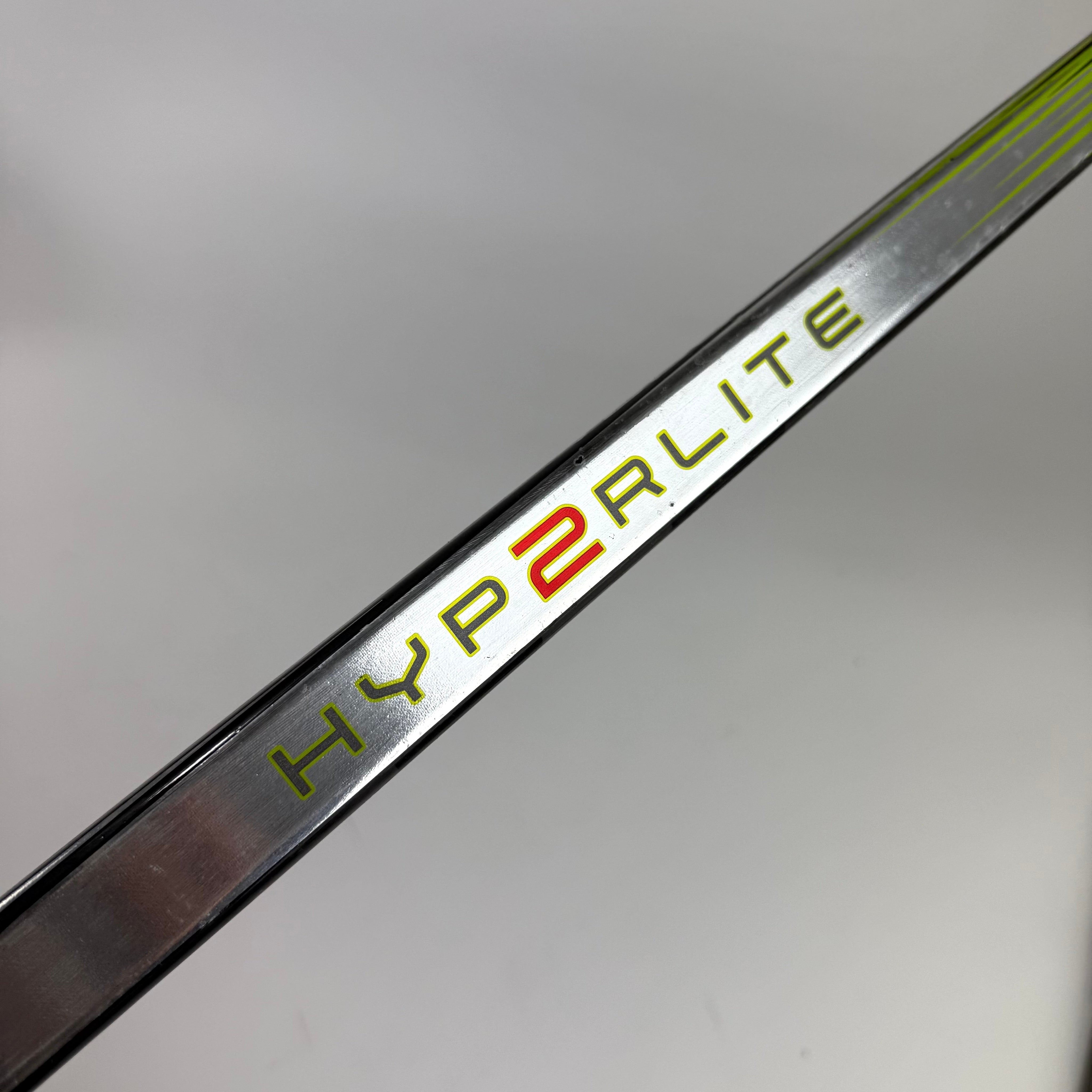 Repaired Left Bauer Vapor Hyperlite 2 | 77 Flex P28 Curve Grip | D16 - Top Flight Hockey