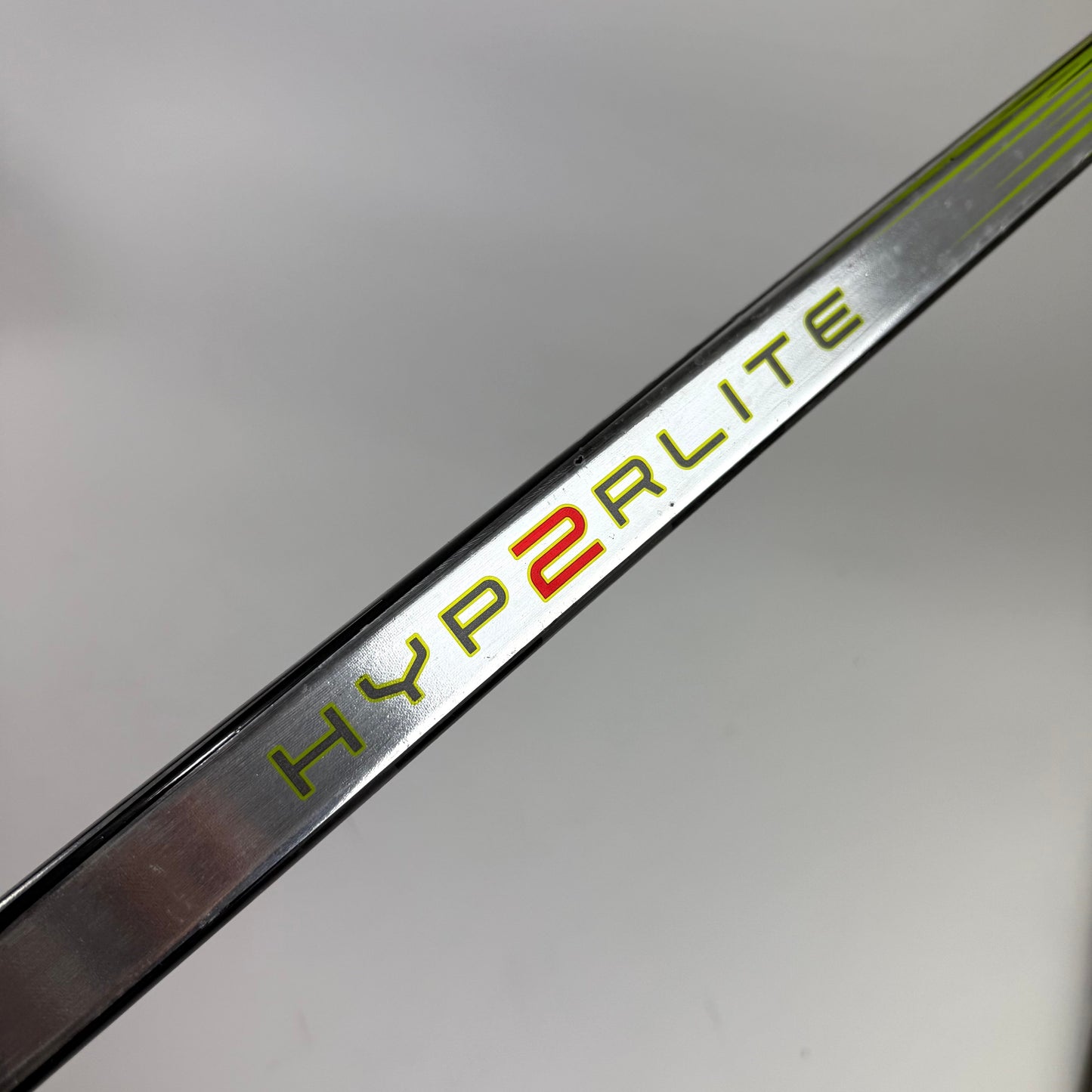 Repaired Left Bauer Vapor Hyperlite 2 | 77 Flex P28 Curve Grip | D16 - Top Flight Hockey