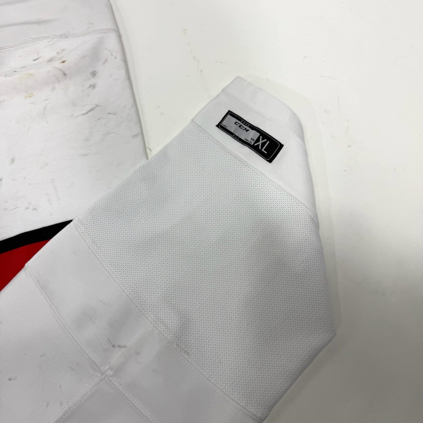 Used White with Red Stripe CCM Socks | XL | AB897