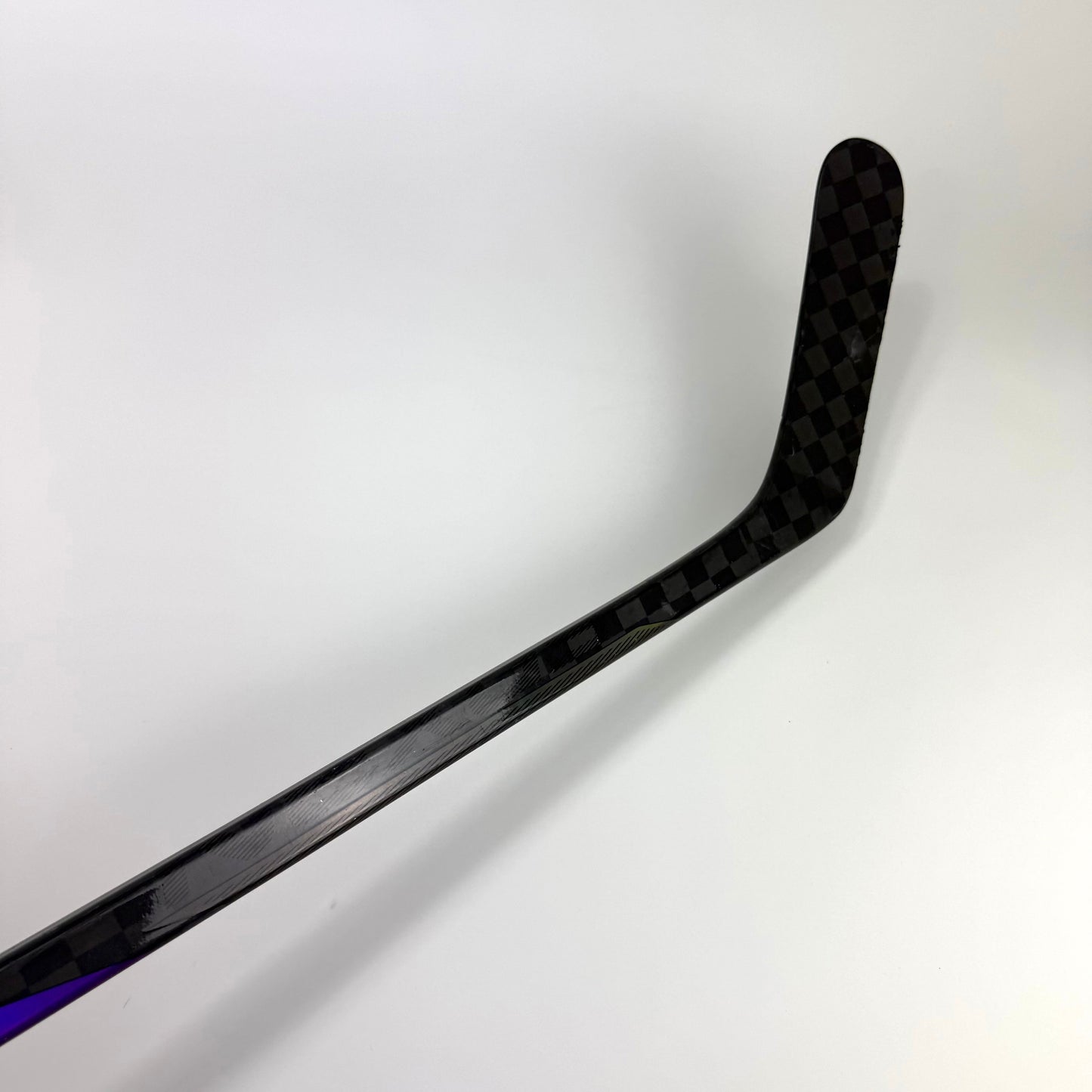 Used Left Purple Bauer Nexus Tracer | 82 Flex P92M Curve Grip | A471