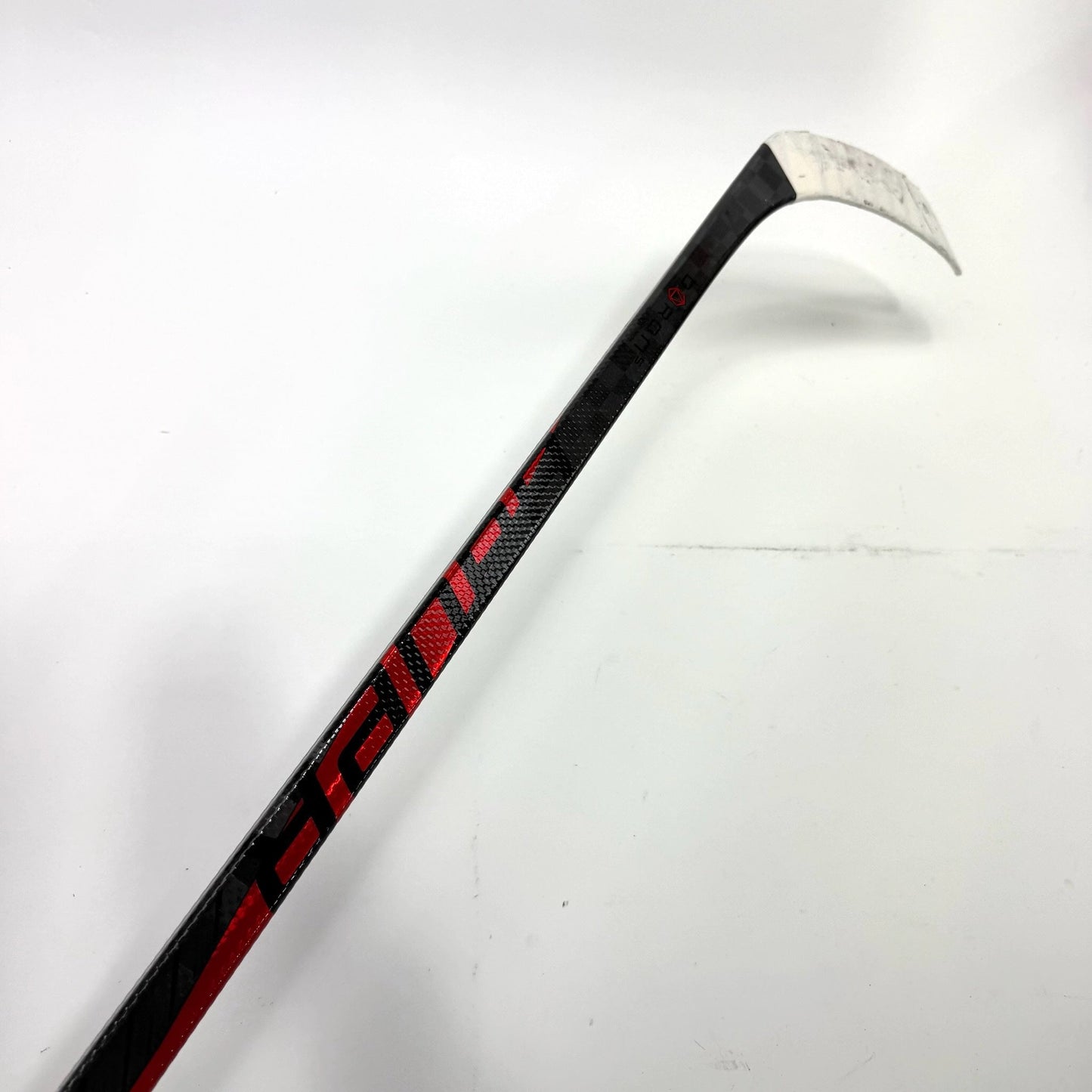 Used Left Red Bauer Pulse | 87 Flex P28 Curve Grip | Matt Gryzelcyk | BH144