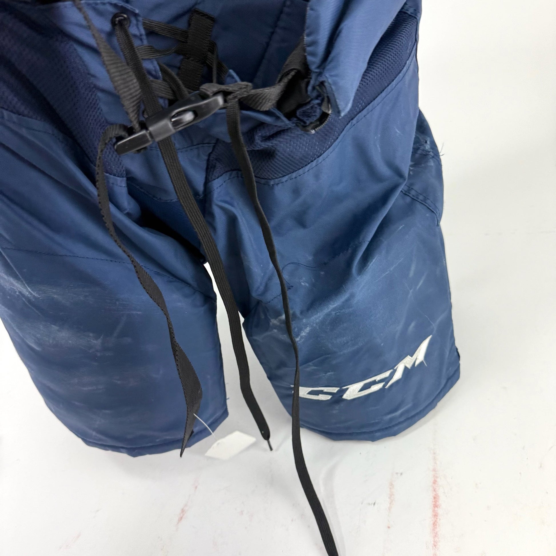 Used Navy CCM HPTKXP Pants | L | F476 - Top Flight Hockey