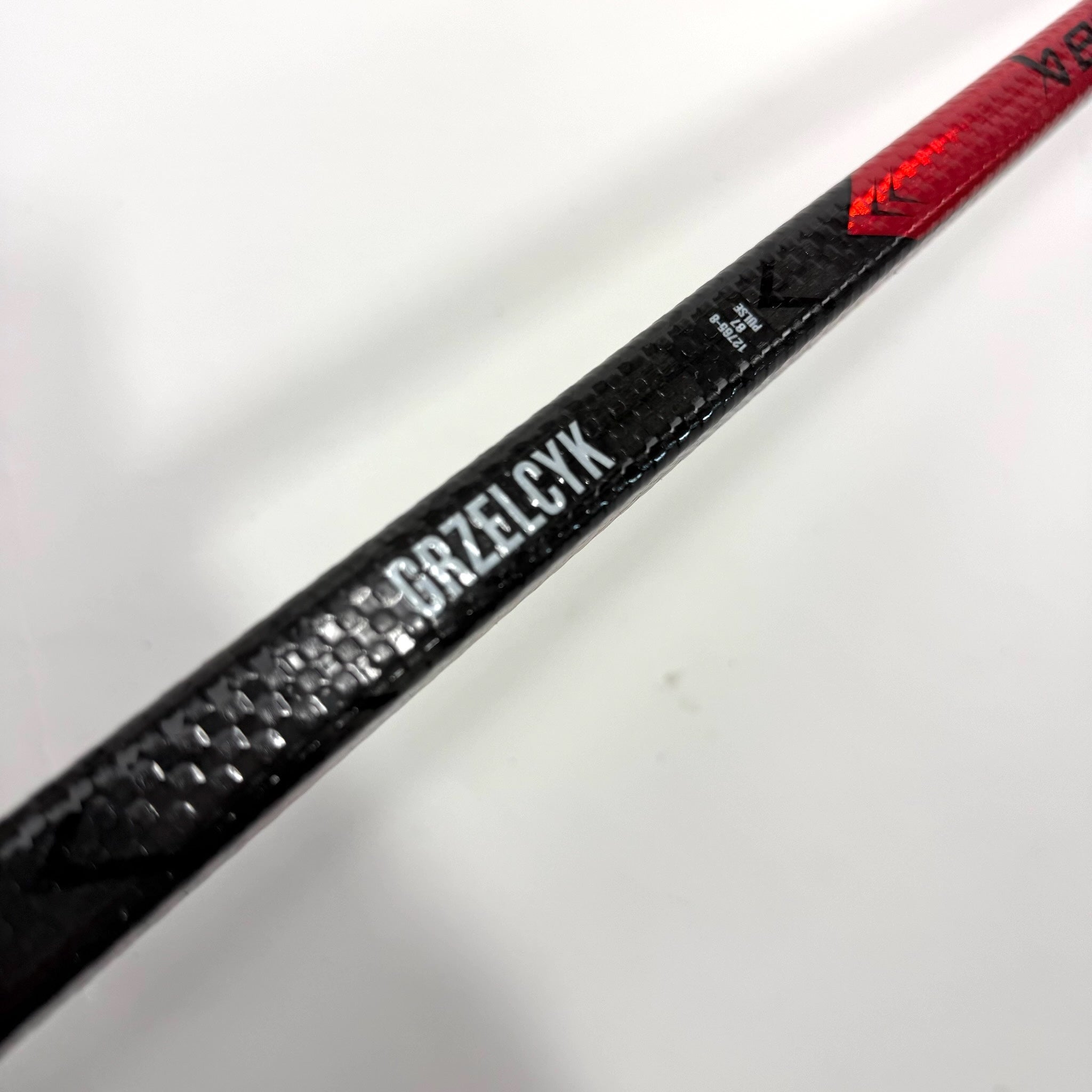 Used Left Red Bauer Pulse | 87 Flex P28 Curve Grip | Matt Gryzelcyk | BH139 - Top Flight Hockey