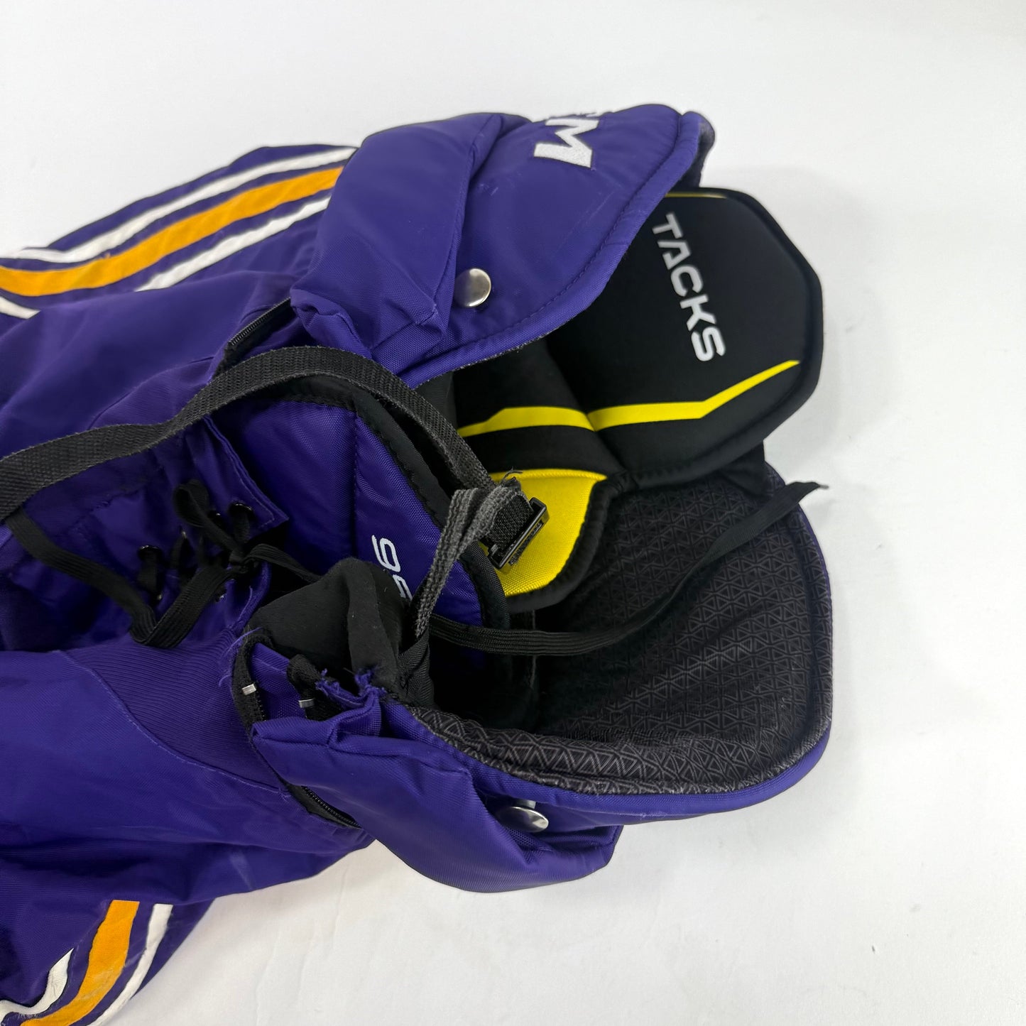 Used Purple/Yellow CCM Tacks 95C Pants | Small | E537