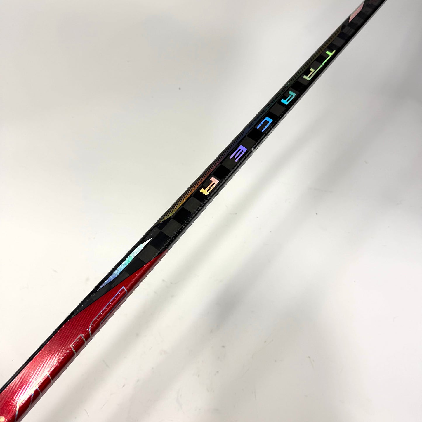 Used Left Red Bauer Nexus Tracer | 70 Flex P90TM Curve Grip | F370