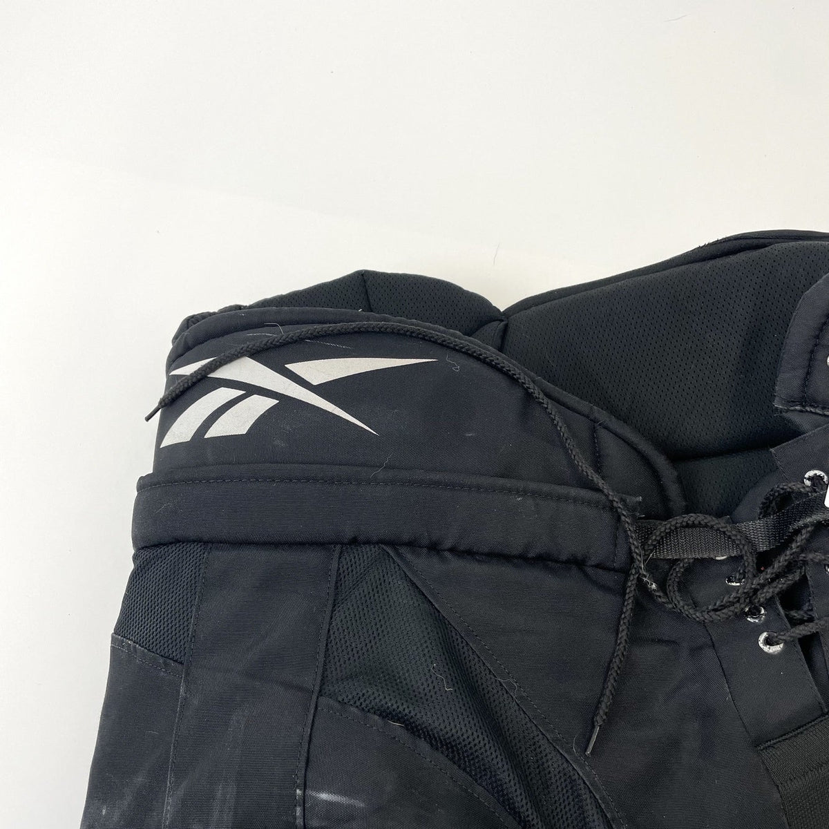 Used Black Reebok Pro Stock Pants | Senior Large | D198 - Top Flight Hockey
