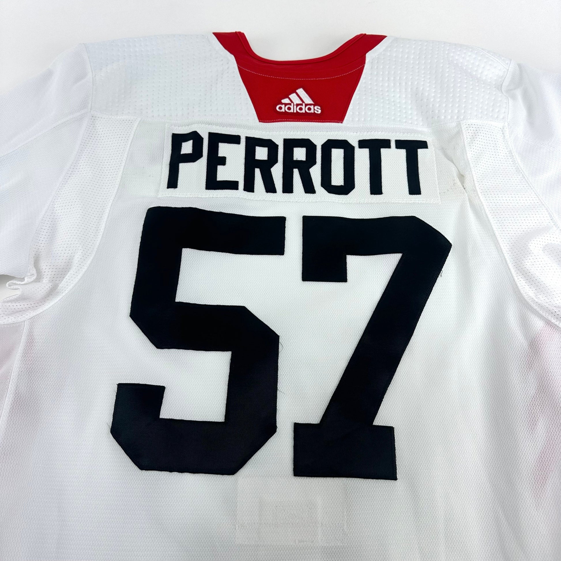PERROTT #57 - White Chicago Blackhawks Camp / Practice Jersey - Adidas MIC Size 56 - Top Flight Hockey
