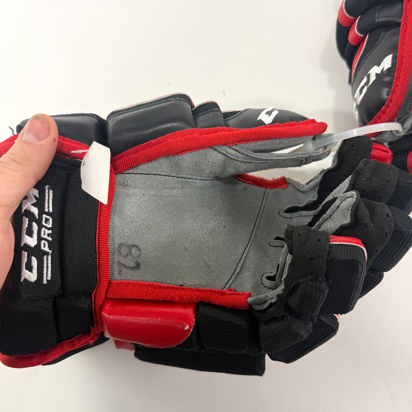 Used Chicago Blackhawks CCM HGCL 13" Gloves | Caleb Jones | L362