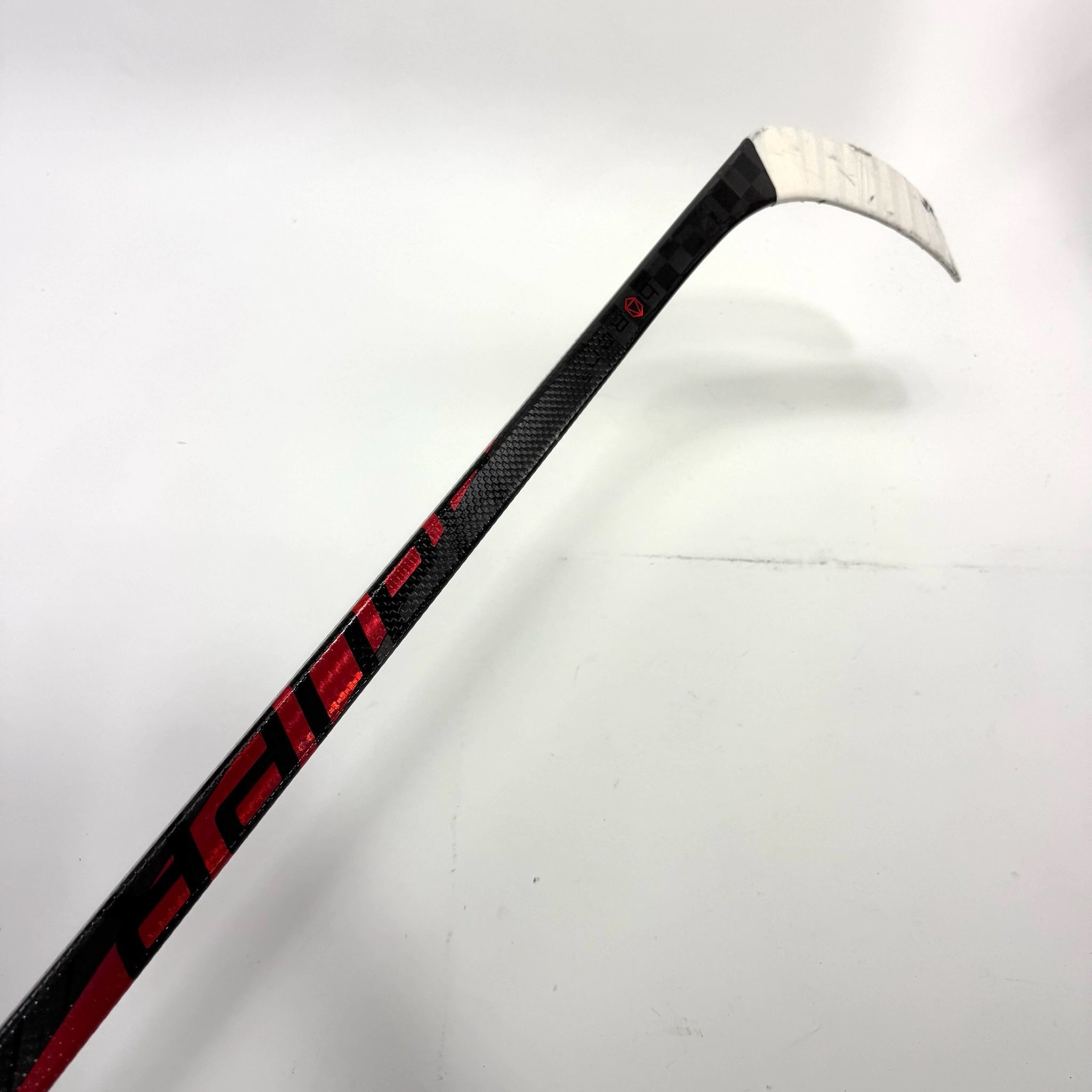 Used Left Red Bauer Pulse | 87 Flex P28 Curve Grip | Matt Gryzelcyk | BH139 - Top Flight Hockey