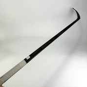 Used Right Black Bauer Vapor Hyperlite 2 | 87 Flex Mackinnon Pro Curve Grip | F303 - Top Flight Hockey