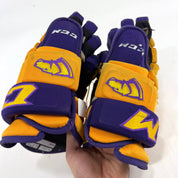 Used Yellow and Purple CCM 4 Roll Pro Gloves | 14" | E550 - Top Flight Hockey