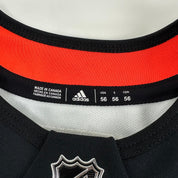 ROMEO #49 - Black Chicago Blackhawks Practice Jersey - Adidas MIC Size 56 - Top Flight Hockey