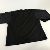 Used Black Bauer Practice Jersey | Medium | U236 - Top Flight Hockey