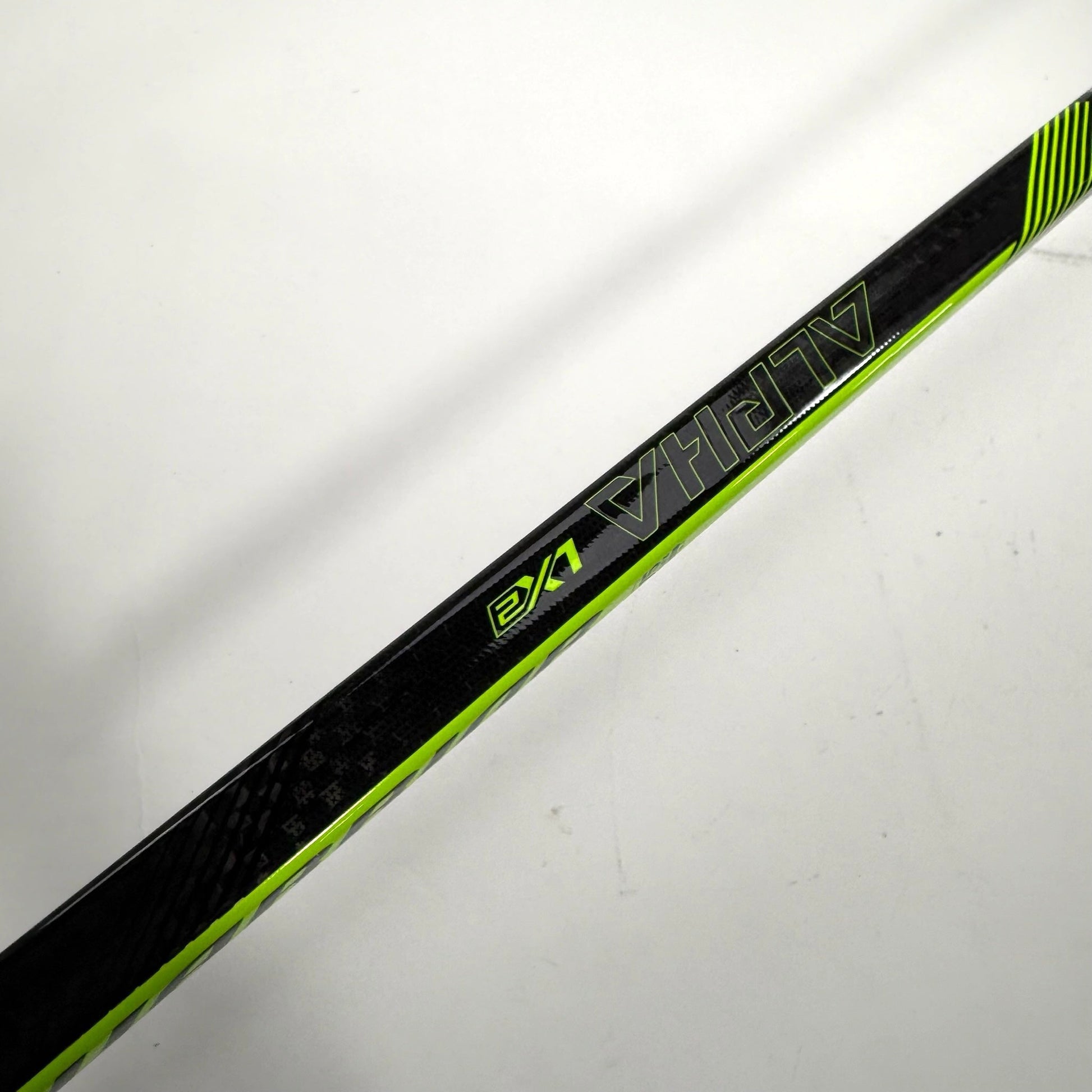 New Left Warrior Alpha LX2 | 75 Flex W03 Curve Grip | BH249 - Top Flight Hockey