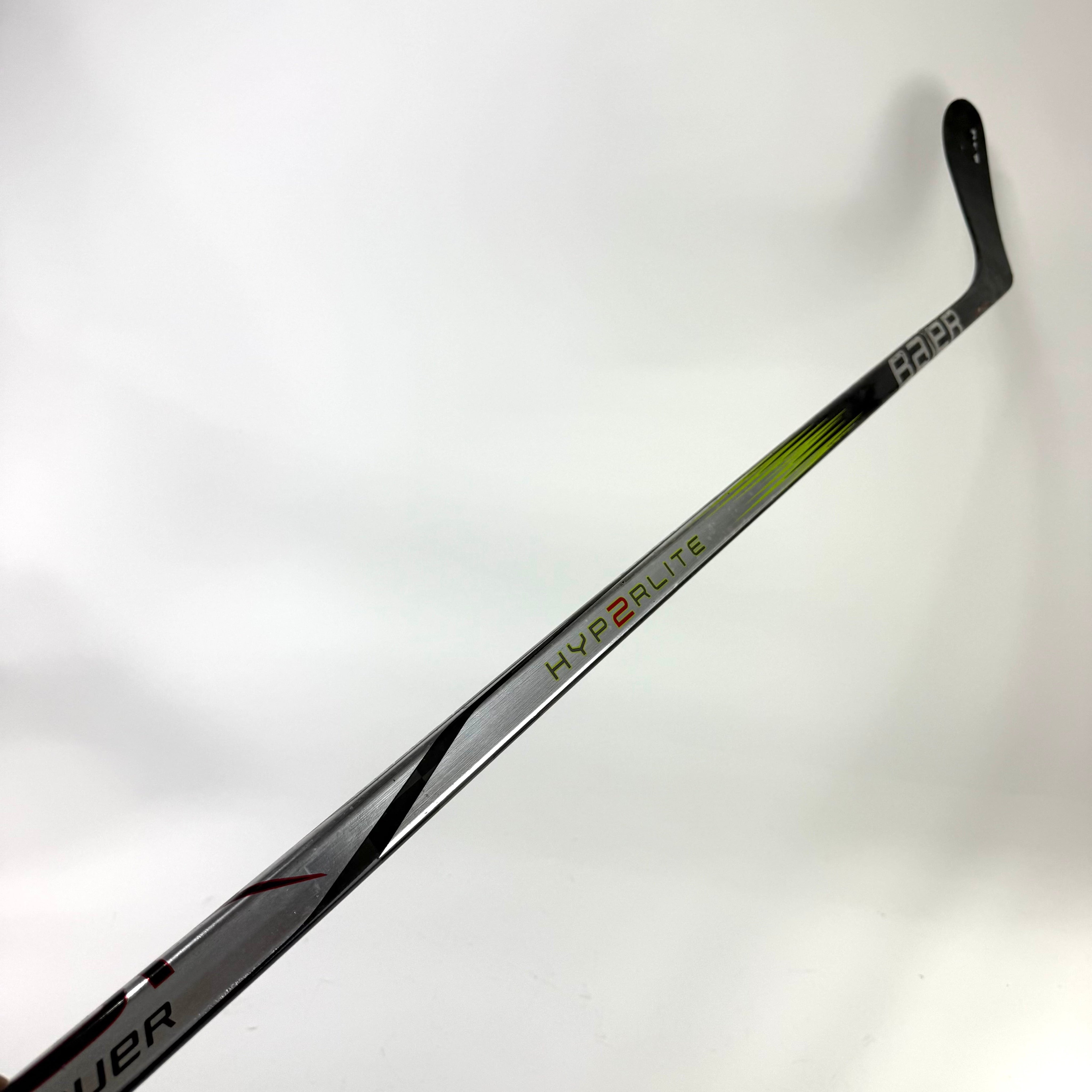 Repaired Left Bauer Vapor Hyperlite 2 | 77 Flex P28 Curve Grip | D16 - Top Flight Hockey