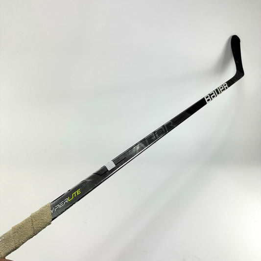 Used Left Bauer Vapor Hyperlite Silver | 77 Flex P28 Curve Grip | Smith | K212 - Top Flight Hockey