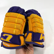 Used Yellow and Purple CCM 4 Roll Pro Gloves | 13" | E519