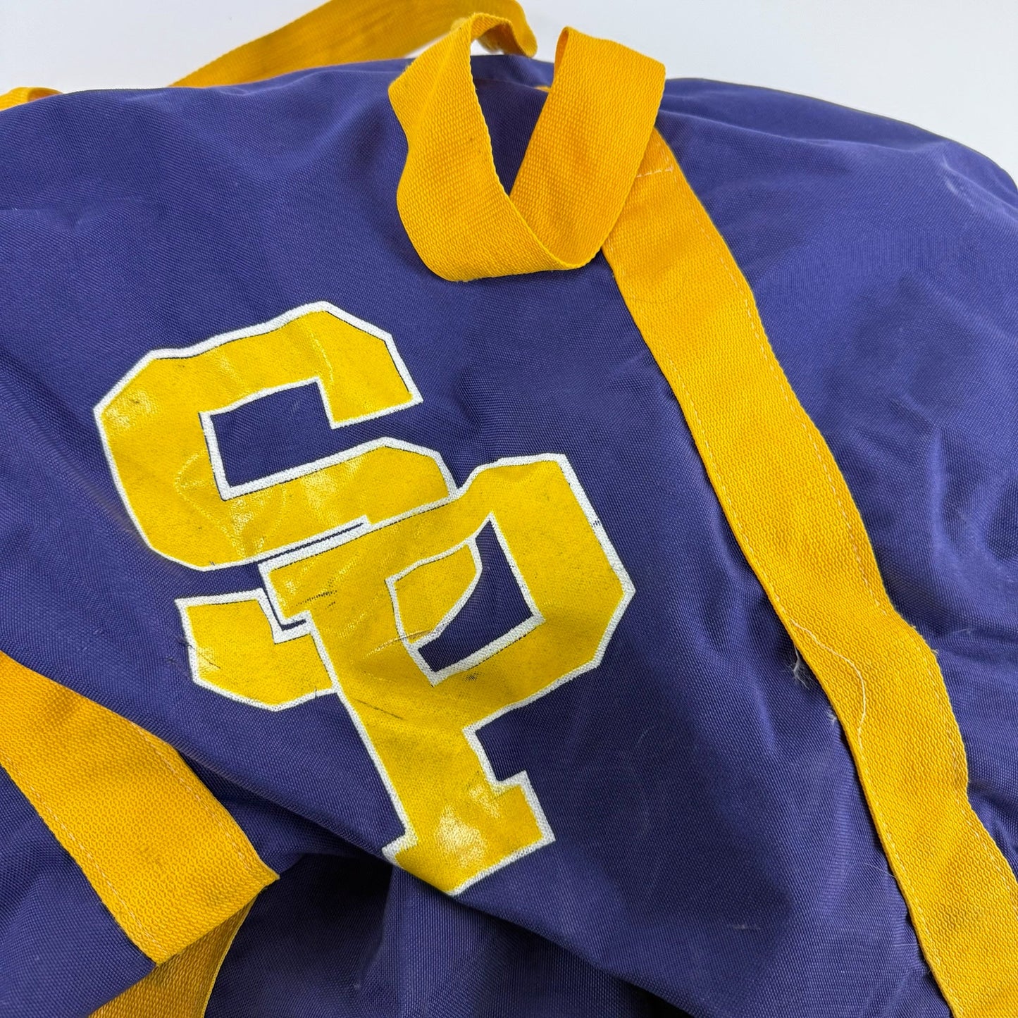 Used Purple and Gold Stevens Point NCAA Player Hockey Bag - Top Flight Hockey
