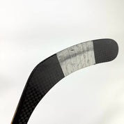 Used Right Warrior Novium Pro | 80 Flex P92M Curve Grip | U394 - Top Flight Hockey