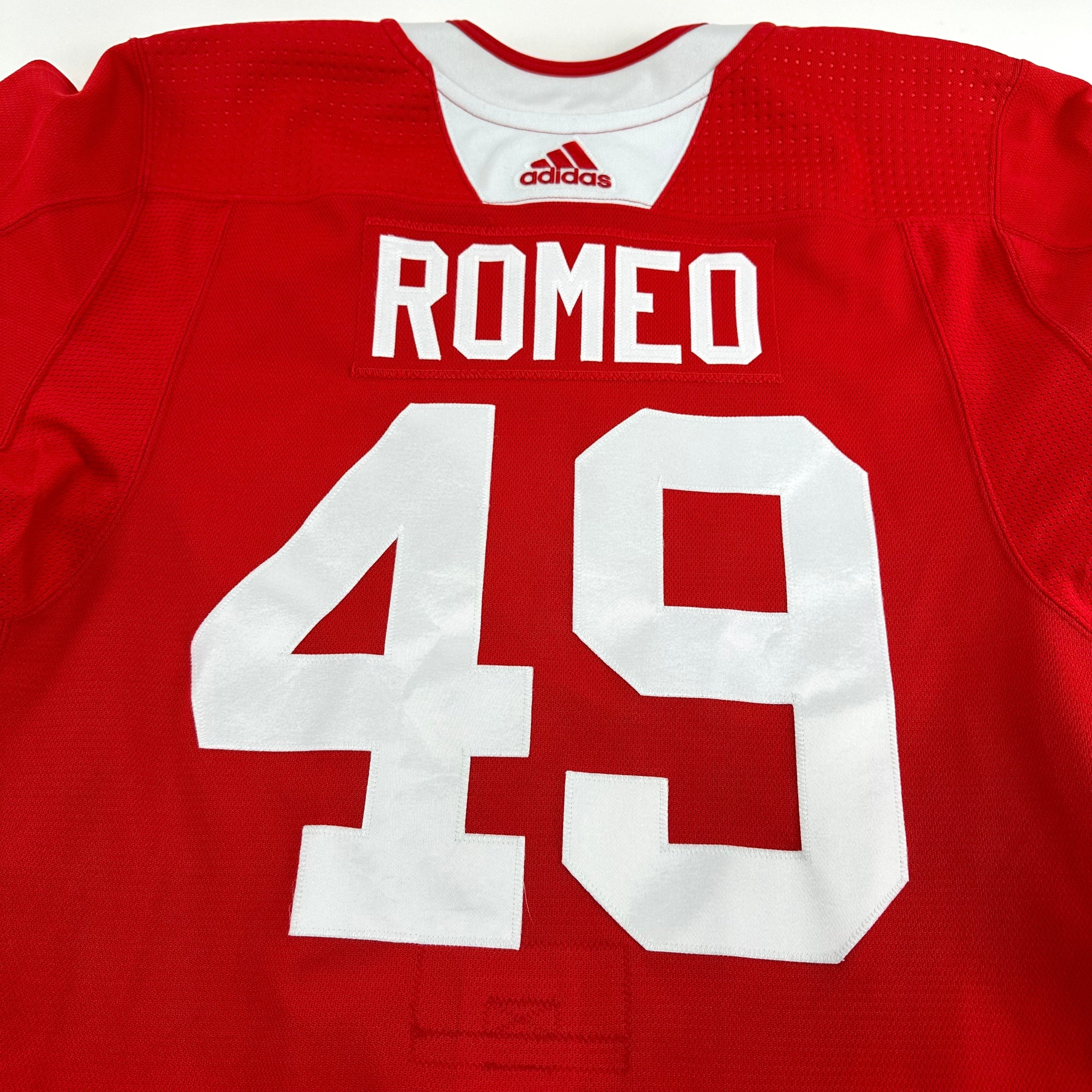 ROMEO #49 - Red Chicago Blackhawks Practice Jersey - Adidas MIC Size 56 - Top Flight Hockey