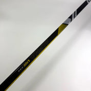 Used Left Yellow Warrior Alpha LX2 Pro | 85 Flex P28 Curve Grip | F362 - Top Flight Hockey