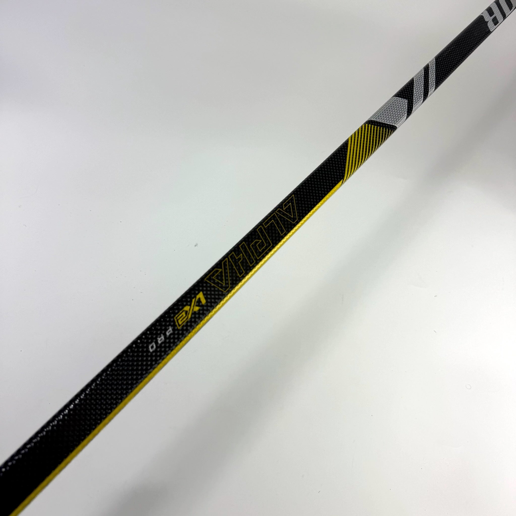 Used Left Yellow Warrior Alpha LX2 Pro | 85 Flex P28 Curve Grip | F361 - Top Flight Hockey