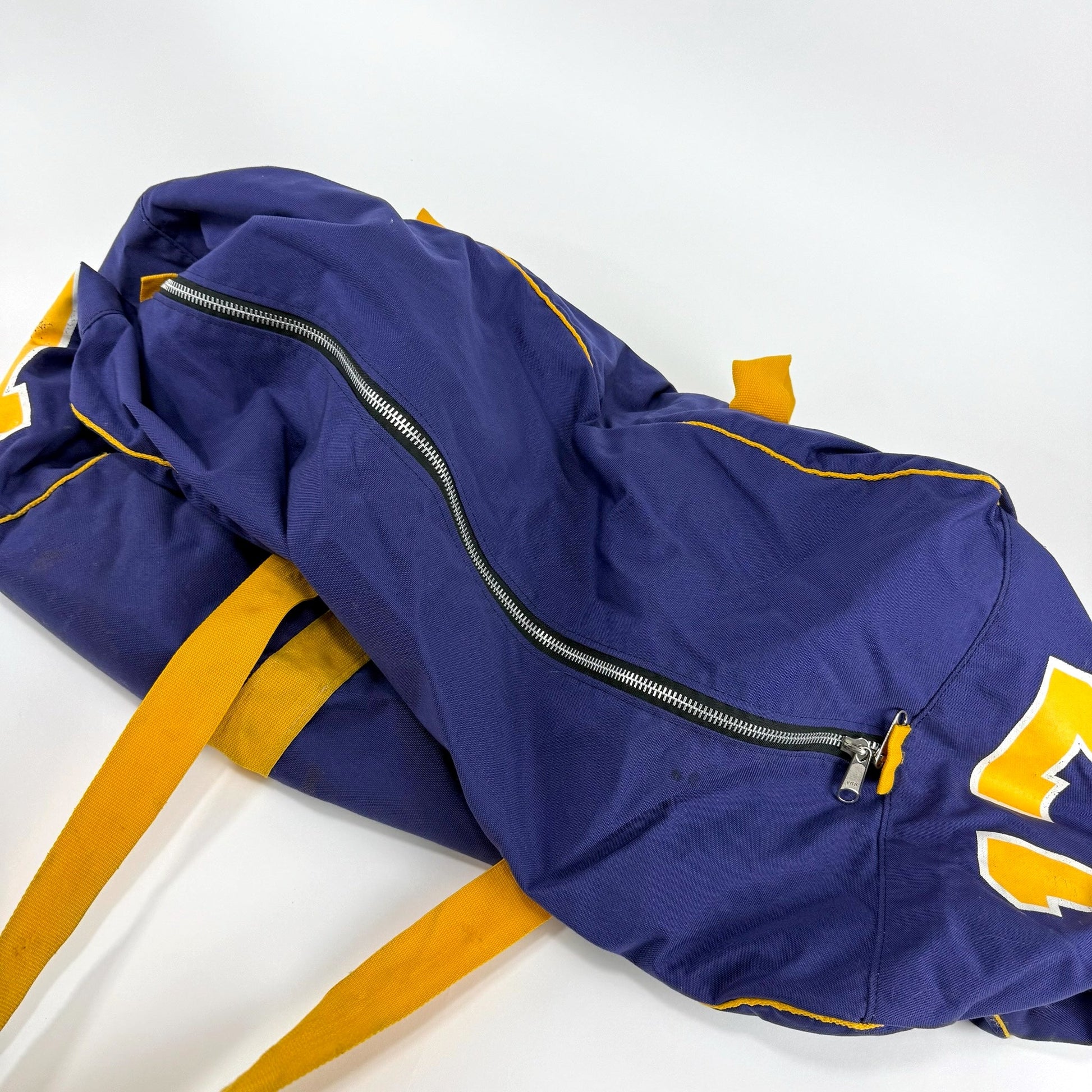 Used Purple and Gold Stevens Point NCAA Player Hockey Bag - Top Flight Hockey