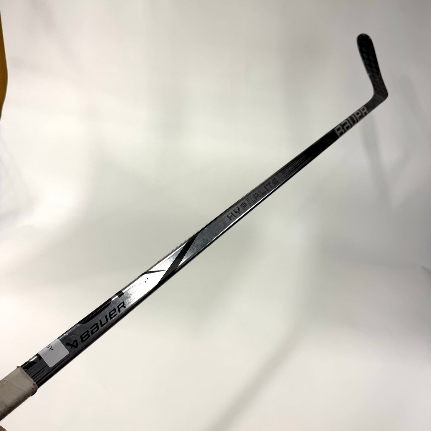 Used Left Silver Bauer Vapor Hyperlite 2 | 70 Flex P90TM Curve Grip | AB722