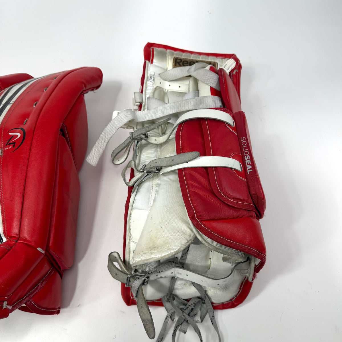 Used Red White and Black Reebok 14k Junior Goalie Leg Pads | 24+1" | AB361