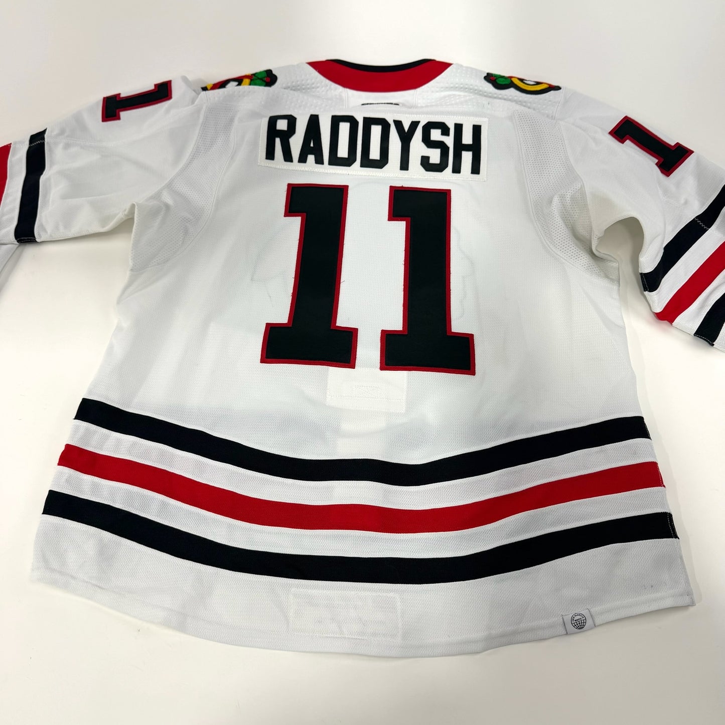Taylor Raddysh #11 Away Chicago Blackhawks Game Worn Jersey 2022-2023, Set 1 | Size 56 | 4098-25517