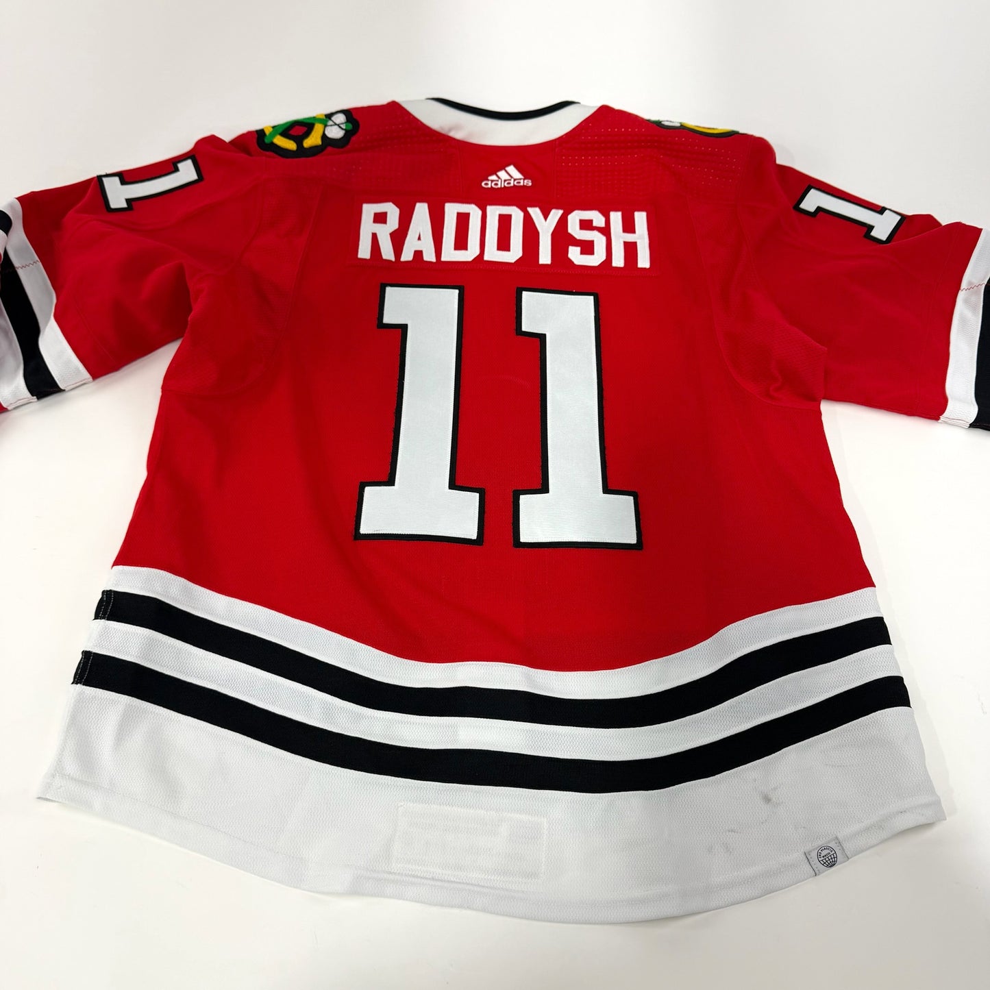 Taylor Raddysh #11 Home Chicago Blackhawks Game Worn Jersey 2022-2023, Set 2 | Size 56 | 6361-25483
