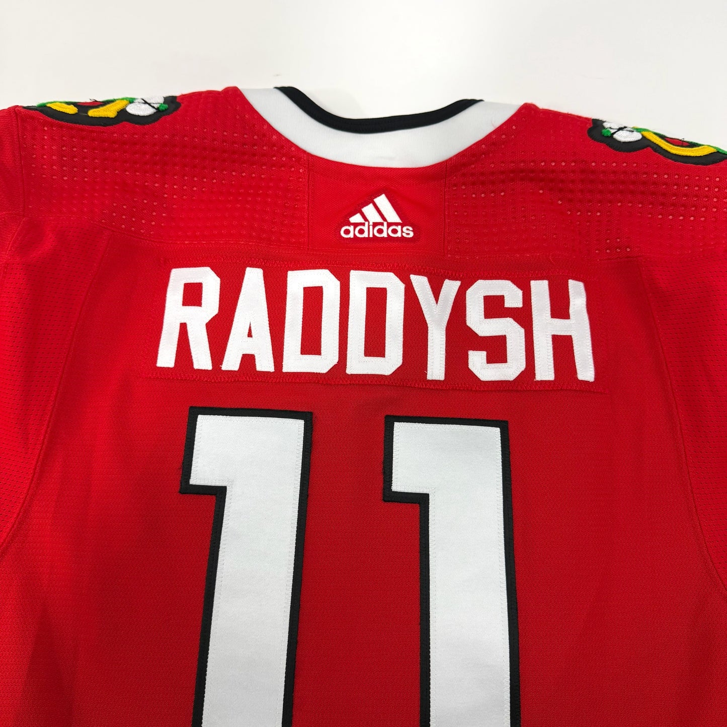 Taylor Raddysh #11 Home Chicago Blackhawks Game Worn Jersey 2023-2024, Set 2 | Size 56 | 6124-25571